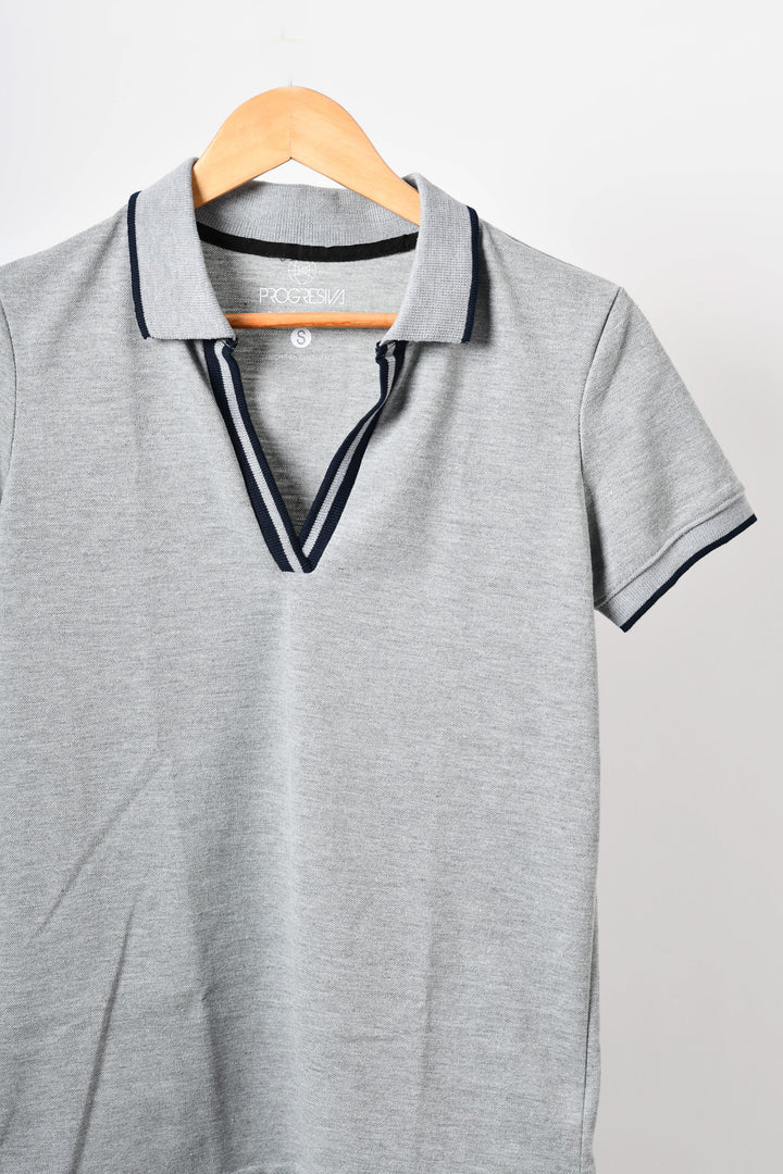Blusa tipo polo de mujer